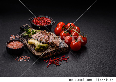 Bowl with slices of baked tuna with broccoli, tomatoes and fusili pasta Bowl with slices of baked tuna with broccoli, tomatoes and fusili pasta 118661057