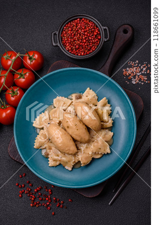 Fish or meat quenelles with delicate mushroom sauce, salt and spices 118661099