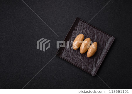 Fish or meat quenelles with delicate mushroom sauce, salt and spices 118661101