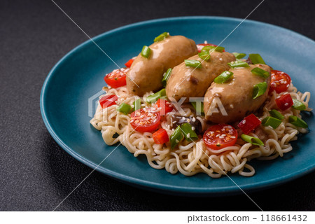Fish or meat quenelles with vegetables, salt and spices in mushroom sauce Fish or meat quenelles with vegetables, salt and spices in mushroom sauce 118661432