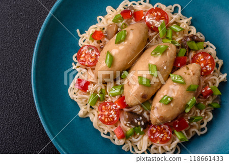 Fish or meat quenelles with vegetables, salt and spices in mushroom sauce 118661433