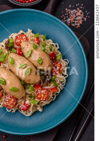 Fish or meat quenelles with vegetables, salt and spices in mushroom sauce 118661437