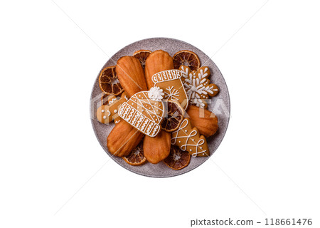 French classic madeleine sponge cake with elements of Christmas motifs 118661476
