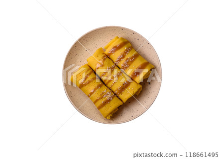 Sweet or savory crepe with different fillings for a hearty breakfast 118661495