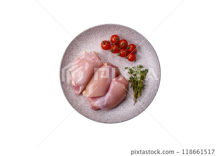 Fresh chicken fillet on a dark concrete table with spices and herbs Fresh chicken fillet on a dark concrete table with spices and herbs 118661517