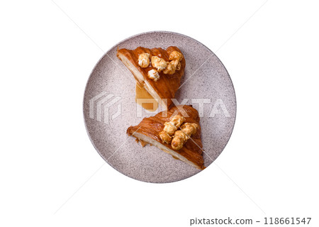 Sweet crispy croissant with salted caramel and glazed popcorn Sweet crispy croissant with salted caramel and glazed popcorn 118661547