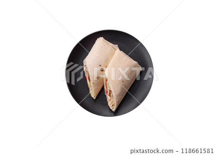 Delicious traditional shawarma or doner kebab with chicken Delicious traditional shawarma or doner kebab with chicken 118661581