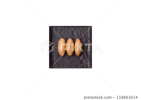 Fish or meat quenelles with delicate mushroom sauce, salt and spices 118661614