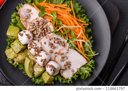 Delicious diet salad with turkey or chicken slices, lettuce, carrots, mozzarella Delicious diet salad with turkey or chicken slices, lettuce, carrots, mozzarella 118661797