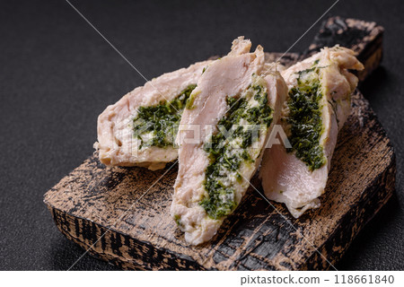 Chicken roulade with spinach, cheese, spices, salt and herbs Chicken roulade with spinach, cheese, spices, salt and herbs 118661840