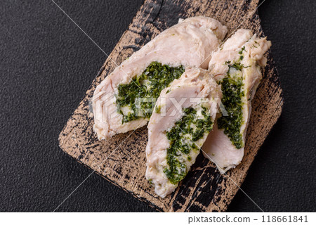 Chicken roulade with spinach, cheese, spices, salt and herbs Chicken roulade with spinach, cheese, spices, salt and herbs 118661841