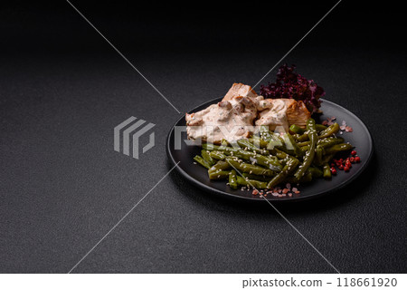 Asian food baked chicken breast with green beans, sesame seeds and sauce Asian food baked chicken breast with green beans, sesame seeds and sauce 118661920