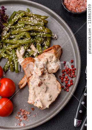 Asian food baked chicken breast with green beans, sesame seeds and sauce Asian food baked chicken breast with green beans, sesame seeds and sauce 118661939