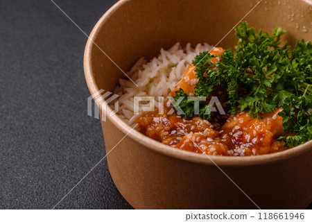 Asian food boiled rice with meat with sweet and sour sauce, spices and herbs 118661946