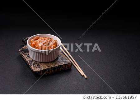 Asian food boiled rice with meat with sweet and sour sauce, spices and herbs 118661957