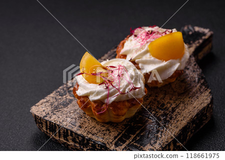 Sweet or sour cupcake with cream cheese, microgreens and filling Sweet or sour cupcake with cream cheese, microgreens and filling 118661975