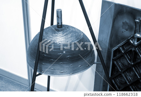 Object printed by 3D printer from metal. Additive manufacturing solution. Object created on 3Dprinter from melting metal thread. 3D Metal Printing. Metal additive manufacturing Object printed by 3D printer from metal. Additive manufacturing solution. Object created on 3Dprinter from melting metal thread. 3D Metal Printing. Metal additive manufacturing 118662318