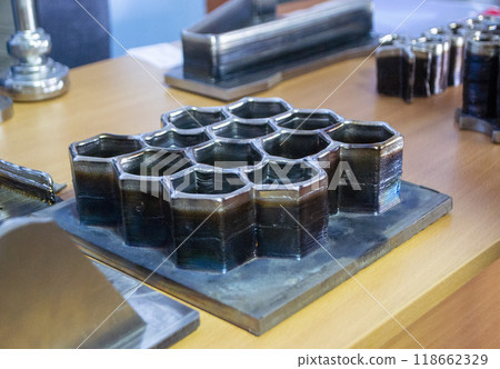 Object printed by 3D printer from metal. Additive manufacturing solution. Object created on 3Dprinter from melting metal thread. 3D Metal Printing. Metal additive manufacturing 118662329
