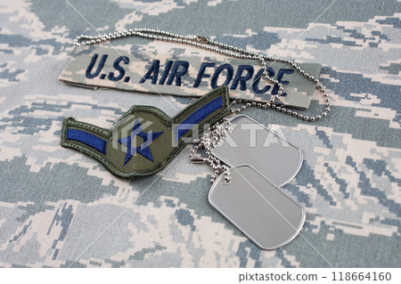 US AIR FORCE branch tape and Airman rank patch and dog tags on digital tiger-stripe pattern Airman Battle Uniform US AIR FORCE branch tape and Airman rank patch and dog tags on digital tiger-stripe pattern Airman Battle Uniform 118664160