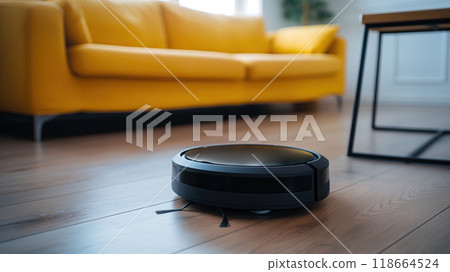 Robot vacuum cleaner on the floor in the living room. Housekeeping concept Robot vacuum cleaner on the floor in the living room. Housekeeping concept 118664524