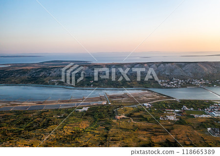Panorama view of salt pans in the Adriatic Sea. Panorama view of salt pans in the Adriatic Sea. 118665389