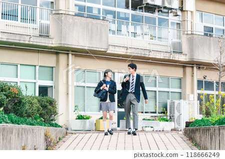A high school couple going home together 118666249