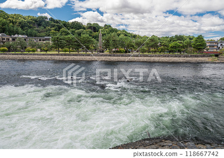 Water flowing out of the spillway into the Uji River, Uji City Water flowing out of the spillway into the Uji River, Uji City 118667742