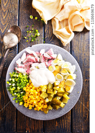 A fresh crab salad, with crabs claw and crab crackers. A fresh crab salad, with crabs claw and crab crackers. 118669679