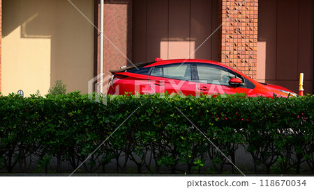 Red car and cityscape Red car and cityscape 118670034