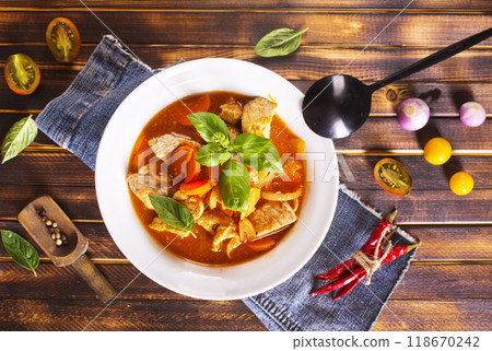 baked meat with tomato sauce 118670242