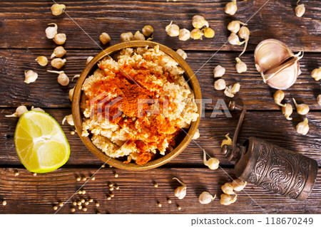 Bowl of hummus dip. Middle Eastern cuisine snack. Bowl of hummus dip. Middle Eastern cuisine snack. 118670249