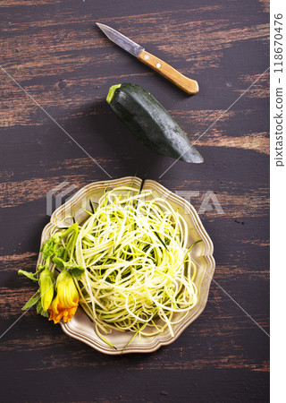 Close-Up of Fresh Zucchini Noodles on metal plate 118670476
