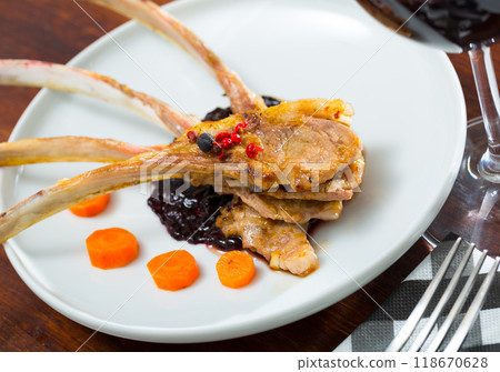 Baked lamb ribs with golden crust Baked lamb ribs with golden crust 118670628