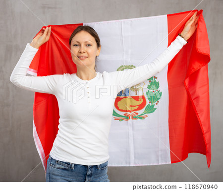 Positive girl with Peru flag rooting for your favorite team Positive girl with Peru flag rooting for your favorite team 118670940