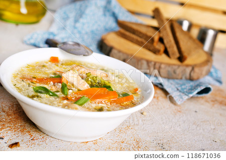 Lohikeitto, salmon fish soup with cream, potato, carrots, leek and dill in bowl Lohikeitto, salmon fish soup with cream, potato, carrots, leek and dill in bowl 118671036
