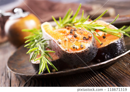 Pieces of red fish fillet. Salmon fillet with rosemary 118671319