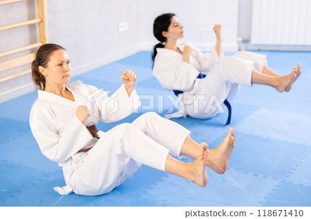 performing various exercises 118671410