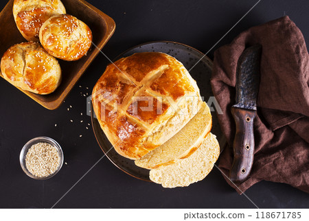 fresh bread on black table fresh bread on black table 118671785