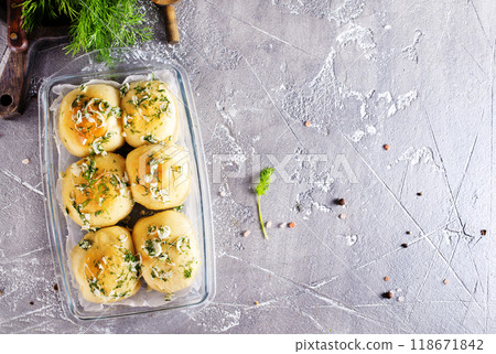 garlic bread stuffed with cheese, baked buns with garlic 118671842