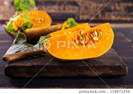 Pumpkins on the table. Autumnal Background. Pumpkins on the table. Autumnal Background. 118671856