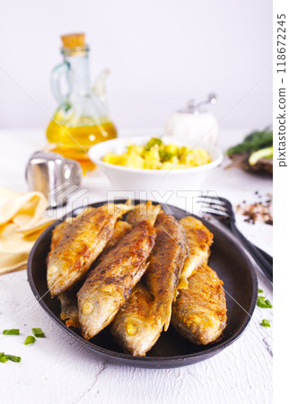 Fish fried with lemon and aroma spice 118672245