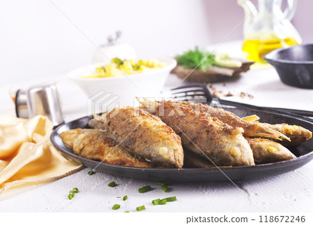 Fish fried with lemon and aroma spice 118672246