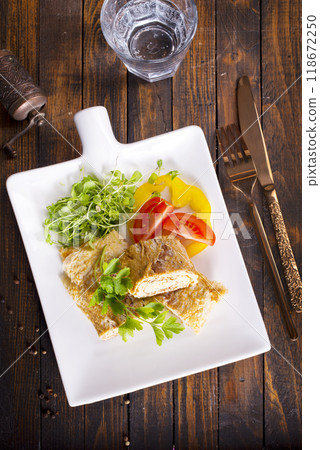 Japanese cuisine. National Japanese dish Omelet tamago yaki for breakfast. 118672250