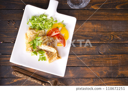 Japanese cuisine. National Japanese dish Omelet tamago yaki for breakfast. 118672251