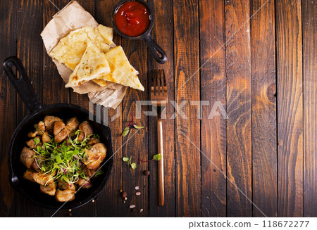 fried meat with spices in pan fried meat with spices in pan 118672277
