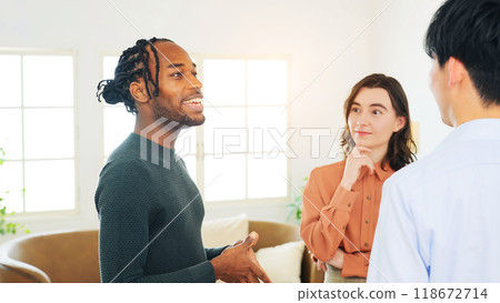 Multinational people standing and talking Multinational people standing and talking 118672714