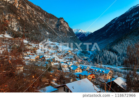 Winter view of small town Filisur in Switzerland at evening Winter view of small town Filisur in Switzerland at evening 118672966