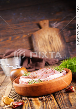 raw steak with aroma spice and salt 118673550