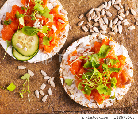 Healthy breakfast, snack, tapas - sandwiches with cream cheese and smoked salmon Healthy breakfast, snack, tapas - sandwiches with cream cheese and smoked salmon 118673563