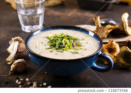 cream soup with dry mushrooms in bowl cream soup with dry mushrooms in bowl 118673566